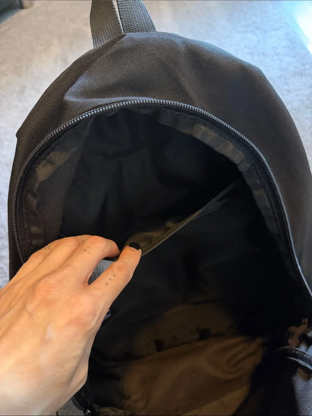 Black Jordan Backpack with Red Jumpman and White Lettering